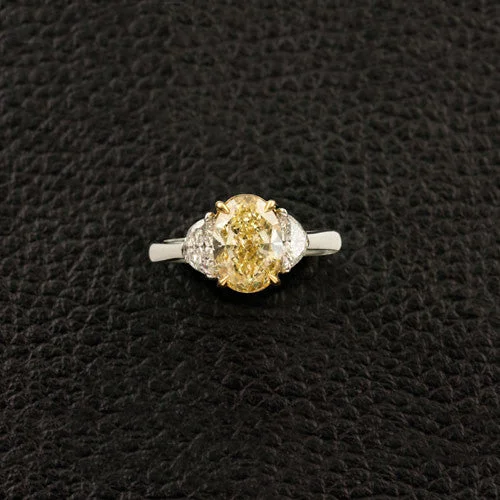 Oval Yellow Diamond Engagement Ring